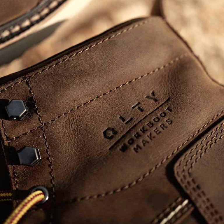 Unlined leather work boot with logo and stitch detail